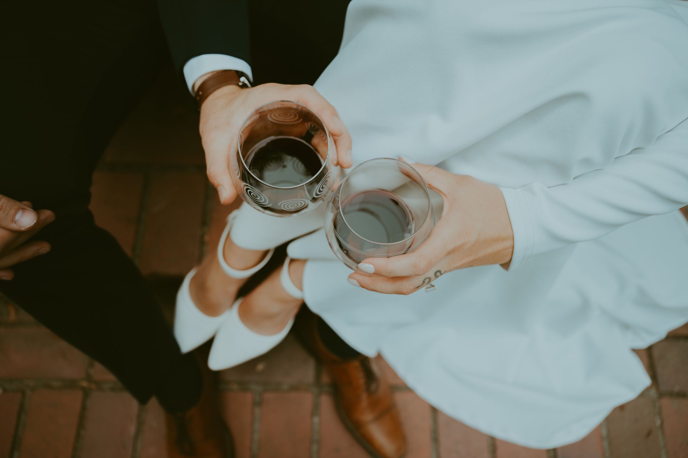 Two glasses of HFV Petite Sirah cheers at wedding